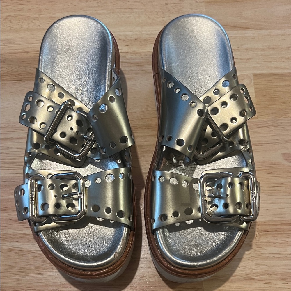 Tod's Gold leather laser cut accent platform slides. Size 36.5